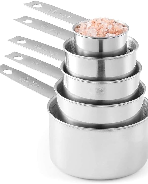Durable, easy to clean, and stackable for clutter-free drawers, these measuring cups are a practical staple in our vacation rental kitchens. The engraved markings are designed to stay readable over time, making the set both functional and easy to use every day.